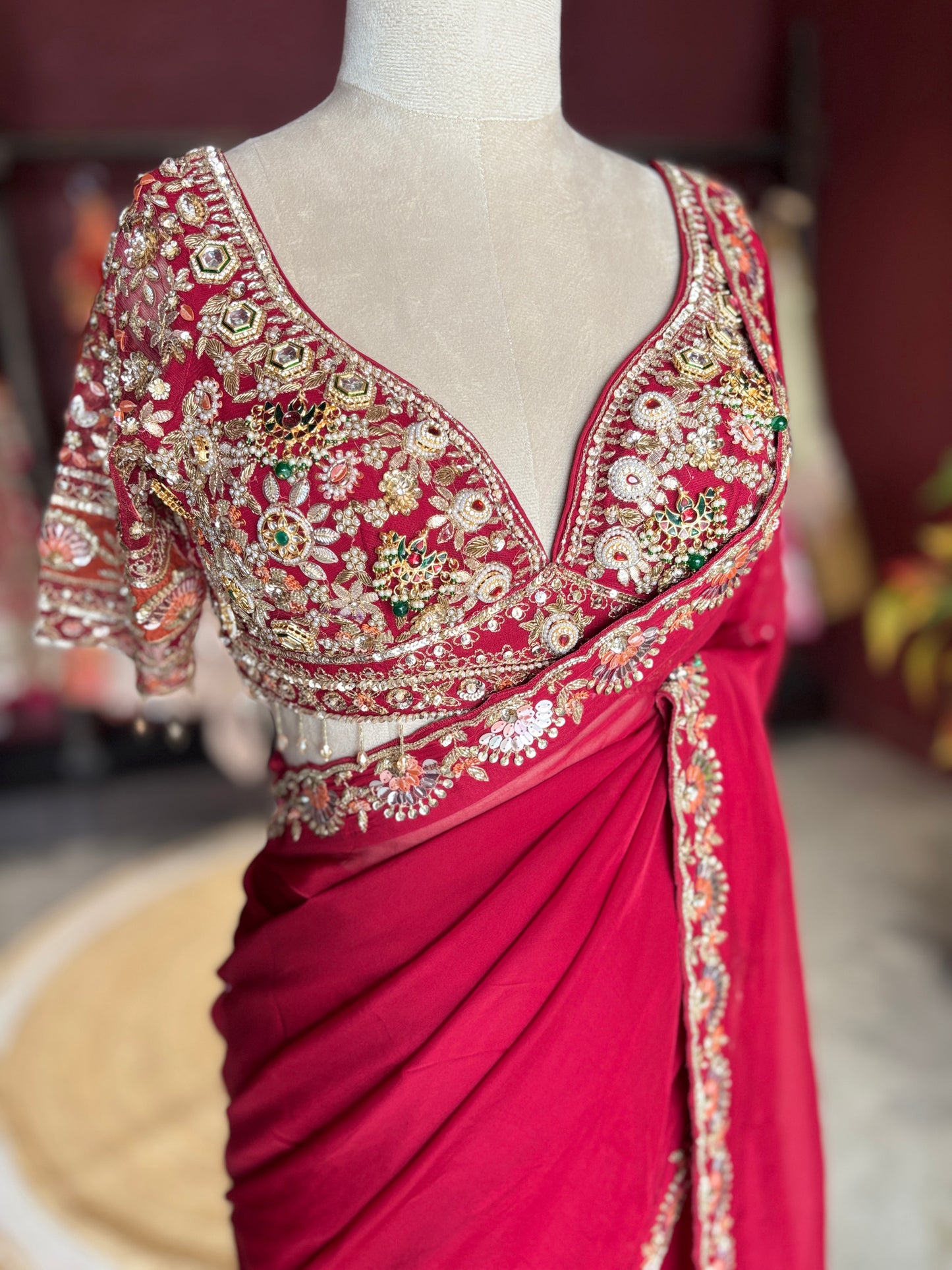 Red Designer Saree with Heavy Embroidered Blouse and Golden Border