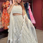 Ivory White Net Lehenga with Heavy Embroidery and Scallop Dupatta