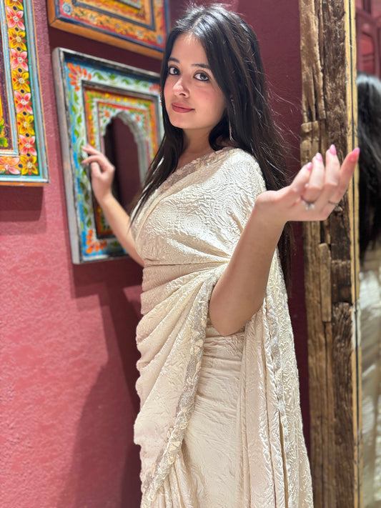 Ivory Self-textured Crepe Saree With Elegant Drape