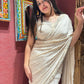 Ivory Self-textured Crepe Saree With Elegant Drape