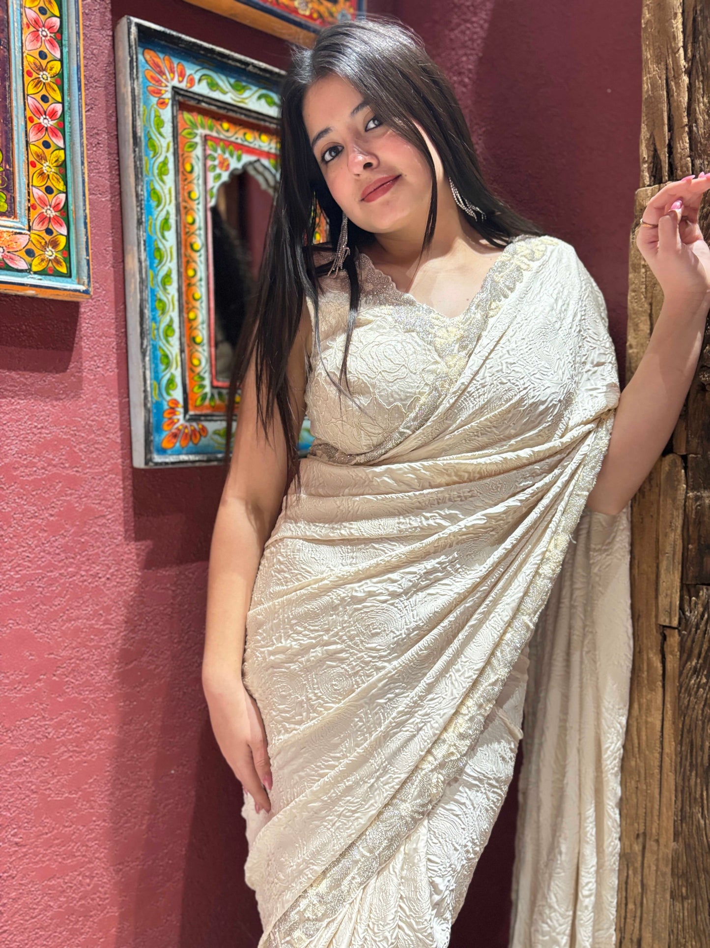 Ivory Self-textured Crepe Saree With Elegant Drape