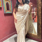 Ivory Self-textured Crepe Saree With Elegant Drape