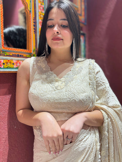 Ivory Self-textured Crepe Saree With Elegant Drape