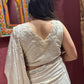 Ivory Self-textured Crepe Saree With Elegant Drape