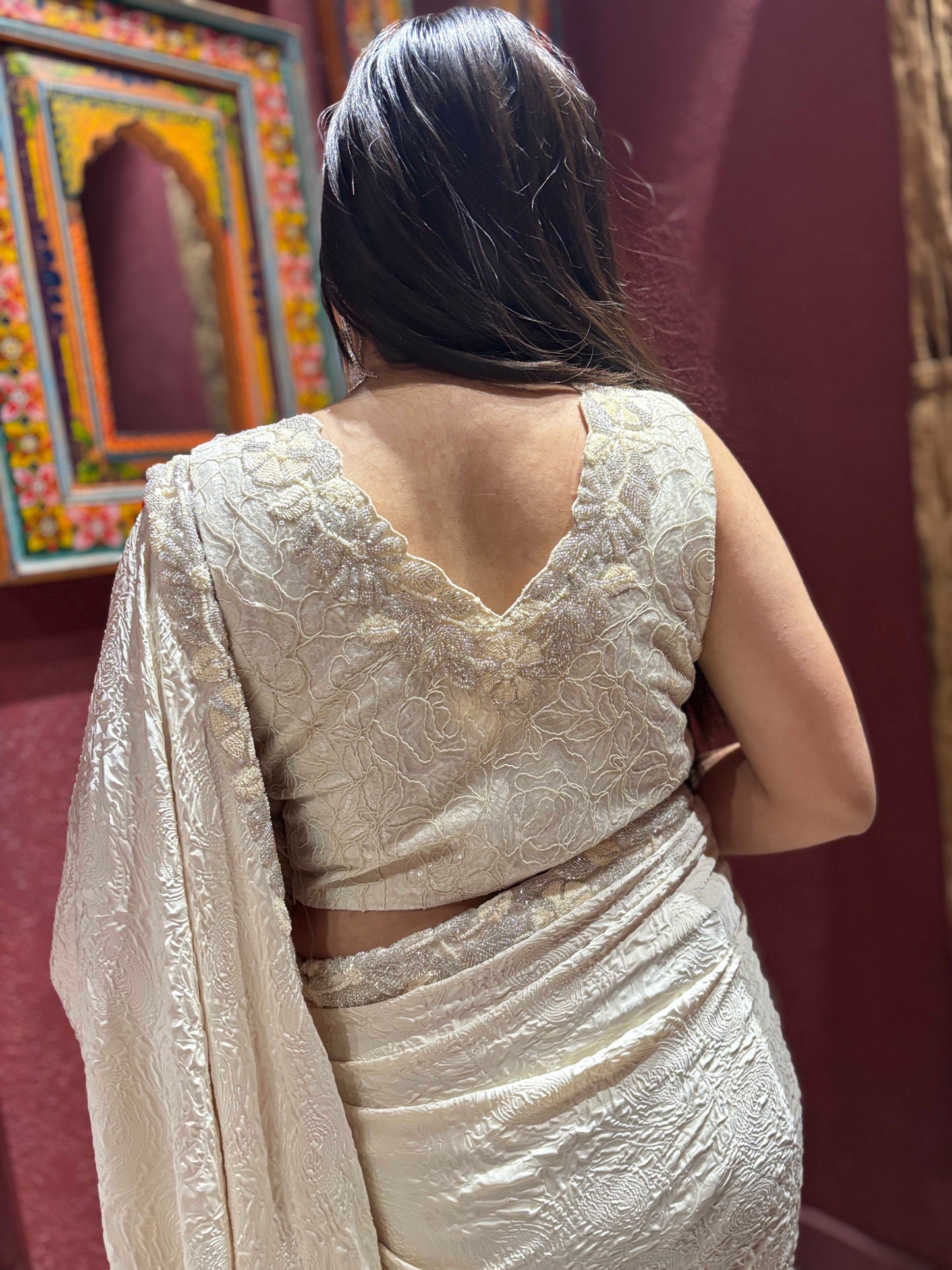 Ivory Self-textured Crepe Saree With Elegant Drape