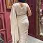 Ivory Self-textured Crepe Saree With Elegant Drape