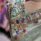 Pistachio Green Embroidered Saree with Peacock Motifs