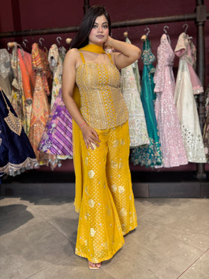 Yellow Embellished Sharara Set with Sequin Peplum Top & Dupatta