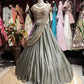 Metallic Grey Draped Lehenga Set with Gold Embellished Blouse