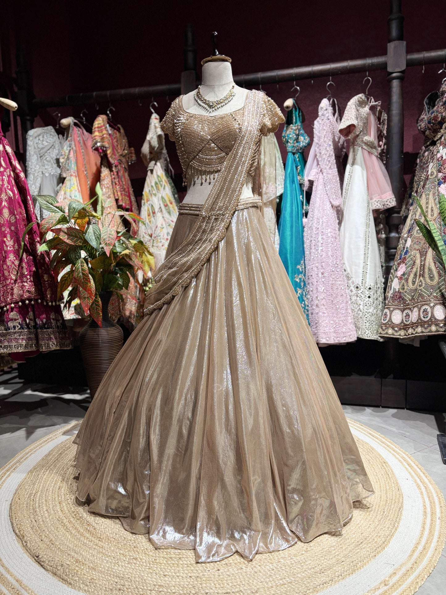 Champagne Gold Shimmer Draped Lehenga Set with Embellished Blouse