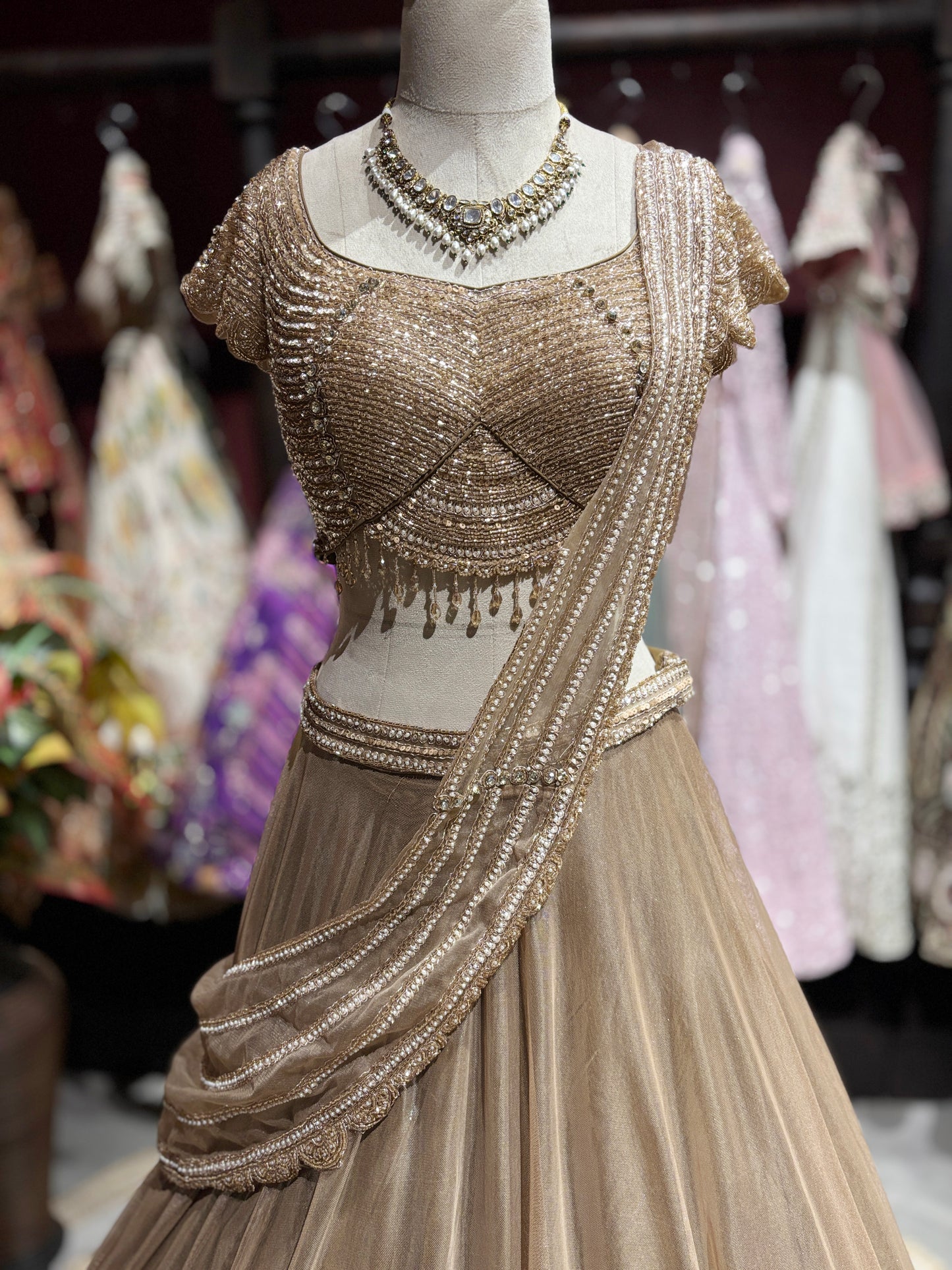 Champagne Gold Shimmer Draped Lehenga Set with Embellished Blouse