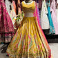 Mustard Yellow Paisley Embellished Lehenga Choli with Pink Dupatta