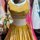 Mustard Yellow Paisley Embellished Lehenga Choli with Pink Dupatta