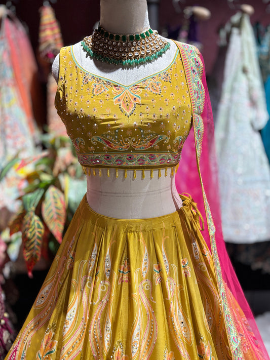 Mustard Yellow Paisley Embellished Lehenga Choli with Pink Dupatta