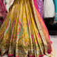 Mustard Yellow Paisley Embellished Lehenga Choli with Pink Dupatta