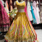 Mustard Yellow Paisley Embellished Lehenga Choli with Pink Dupatta