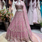 Designer Pink Embellished Grand Lehenga with Halter Blouse & Dupatta