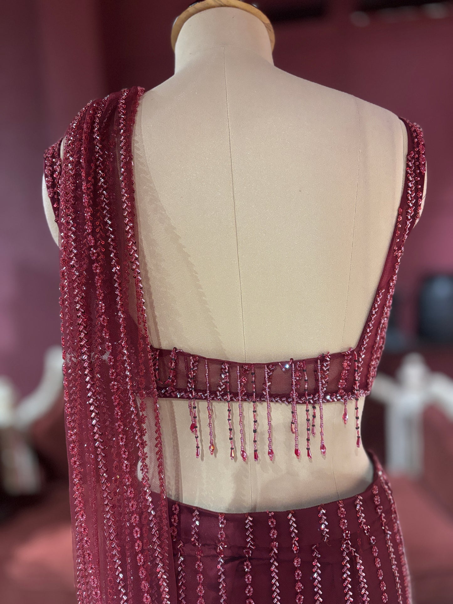 Designer Maroon Drape Saree with Sequined Elegance