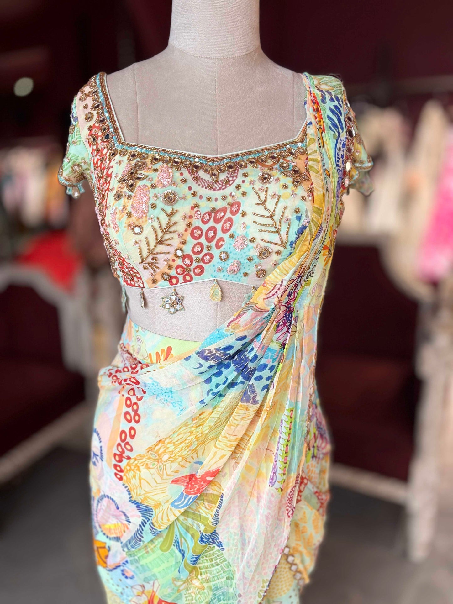 Pastel Multicolor Printed Draped Saree with Embellished Blouse
