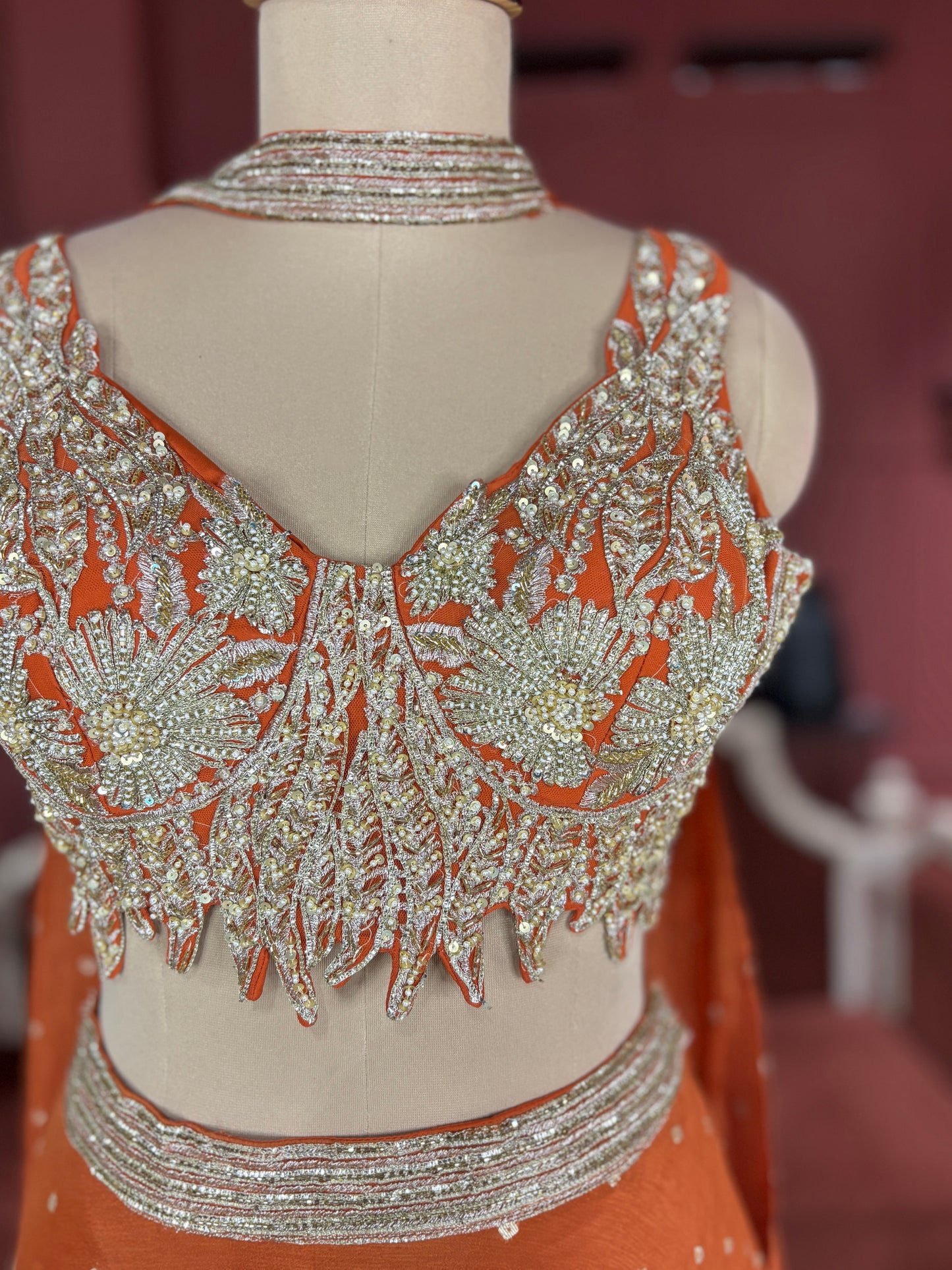 Designer Chinon Orange Lehenga with Embroidered Sleeveless Blouse