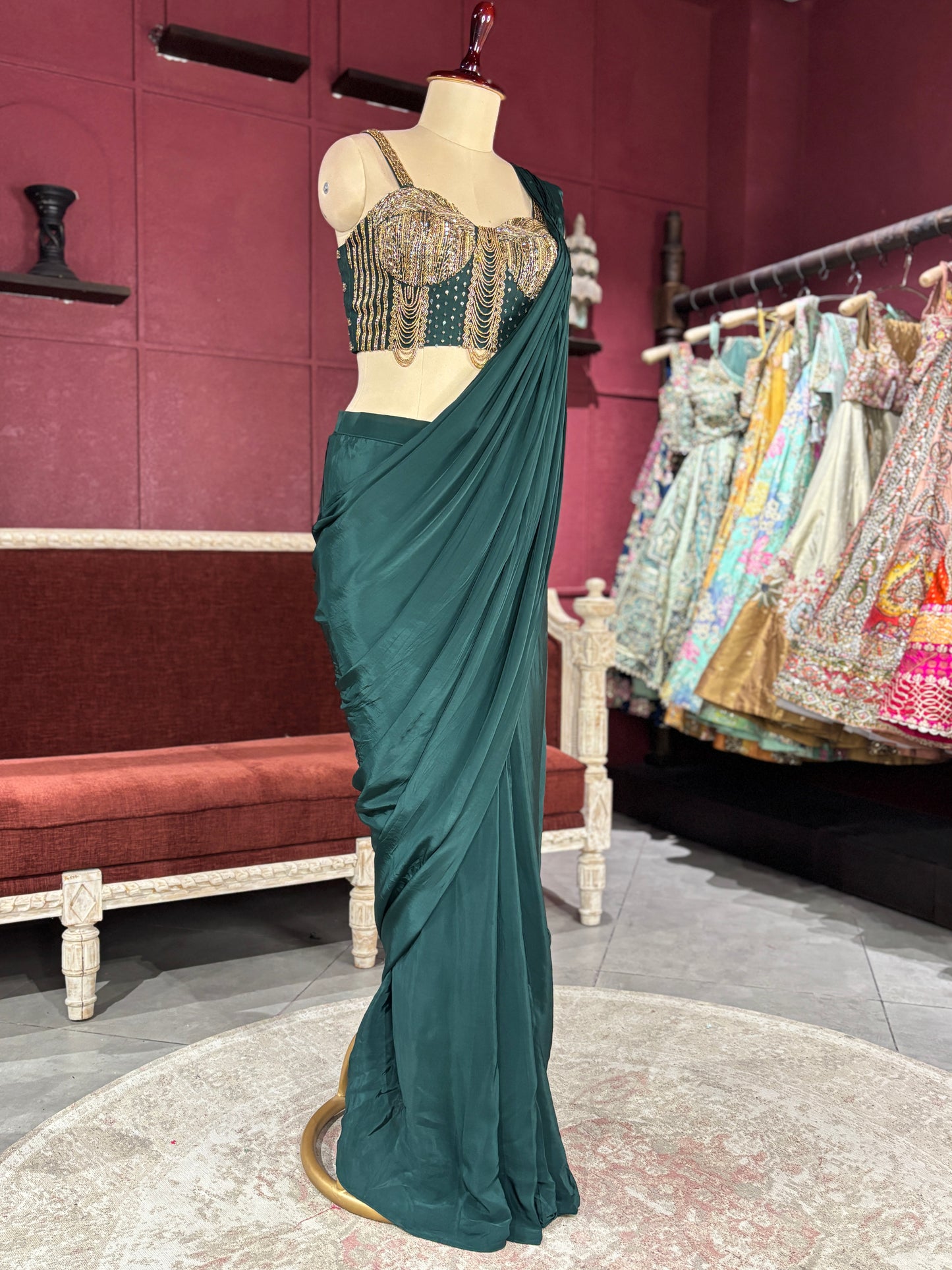 Designer Dark Green Drape Saree with Ornate Blouse