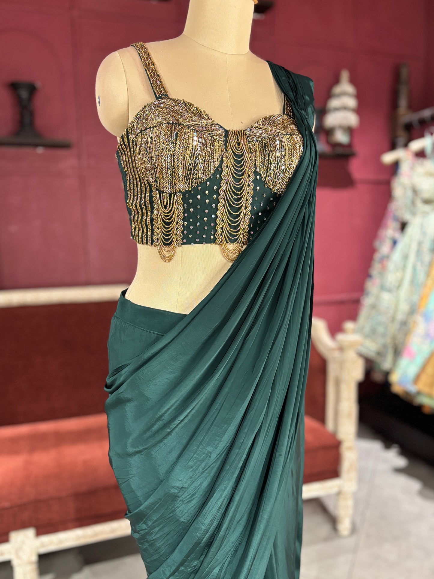 Designer Dark Green Drape Saree with Ornate Blouse