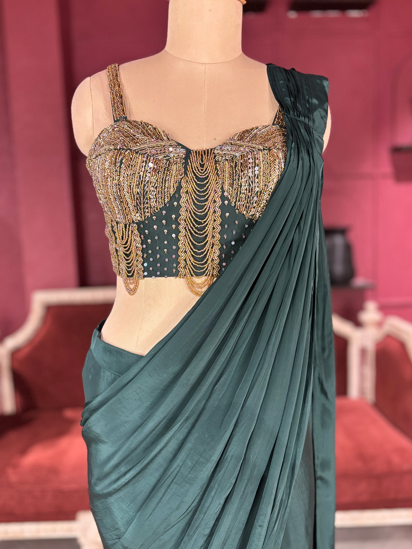 Designer Dark Green Drape Saree with Ornate Blouse