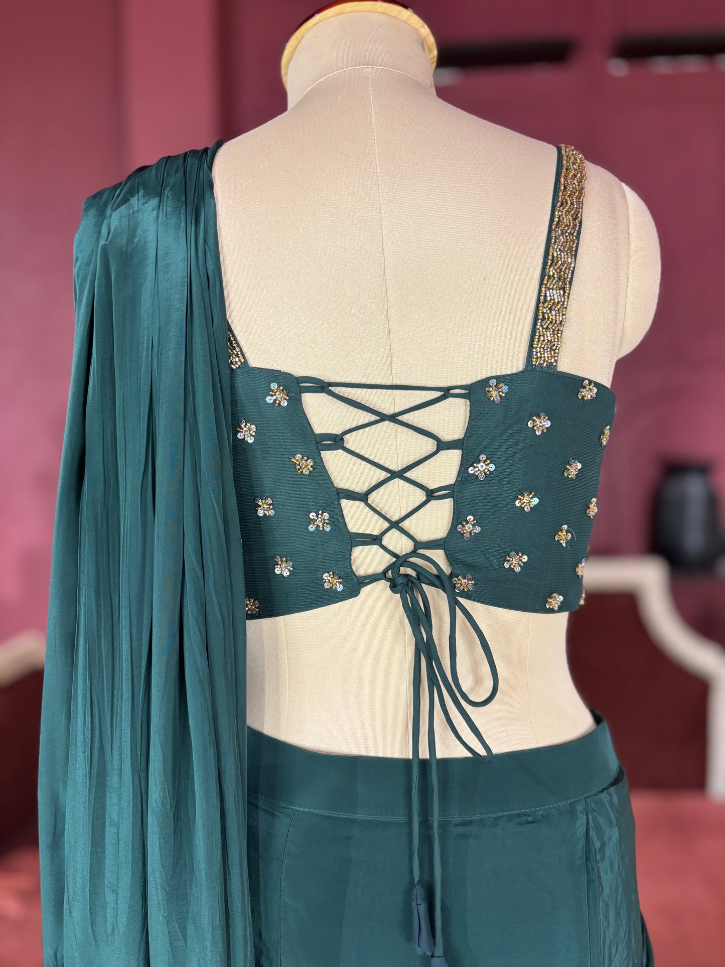 Designer Dark Green Drape Saree with Ornate Blouse