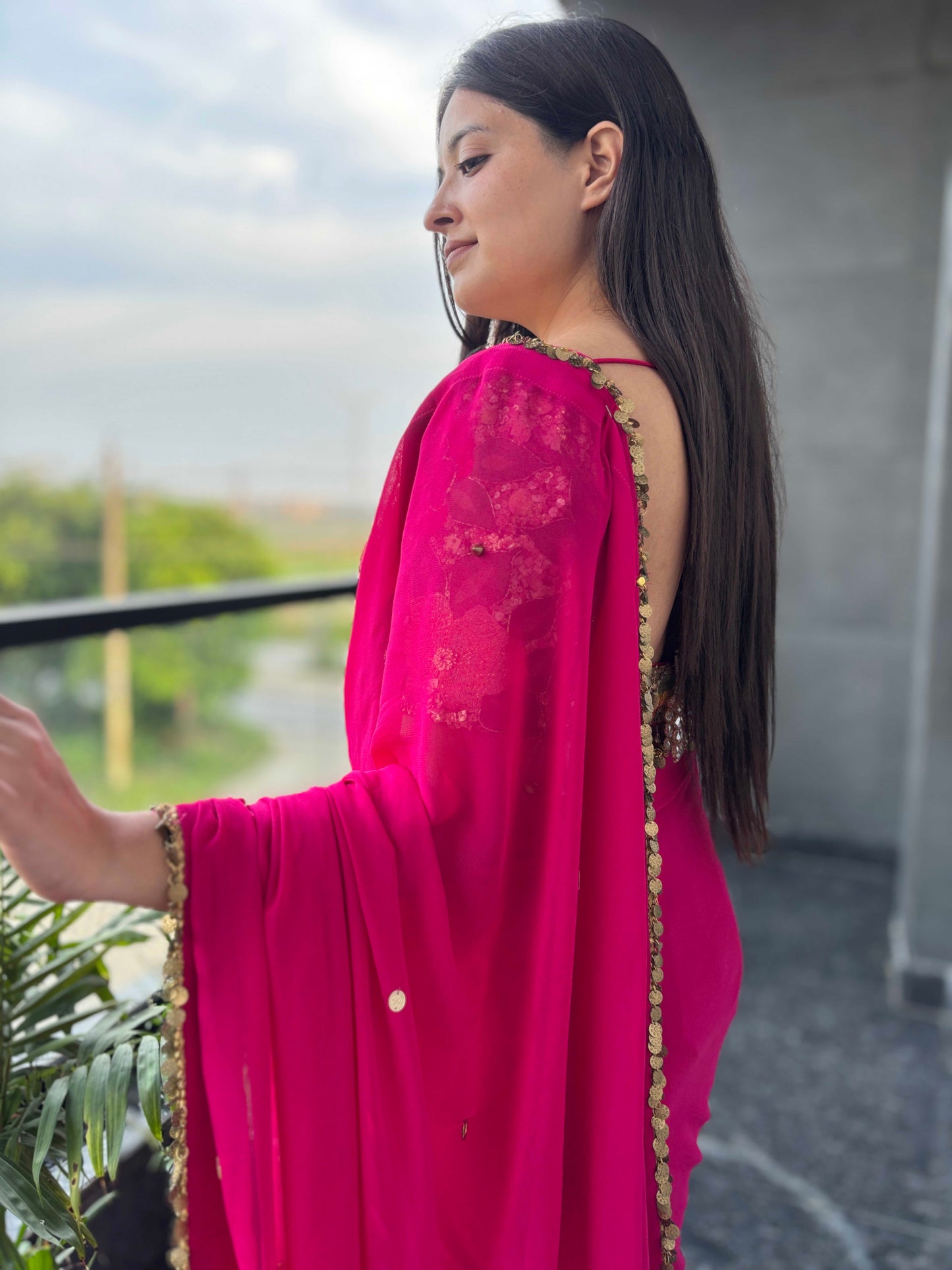 Rani Pink Georgette Saree with Floral Blouse & Golden Lace Border